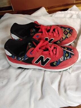 New Balance Red Athletic Sneakers with Multicolor Bead-Pattern Accents